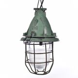 Industrial caged green lamp