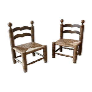 Chaises basses en bois et paille