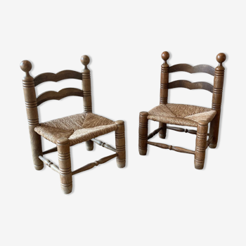Suite of two low chairs in wood and straw 1960