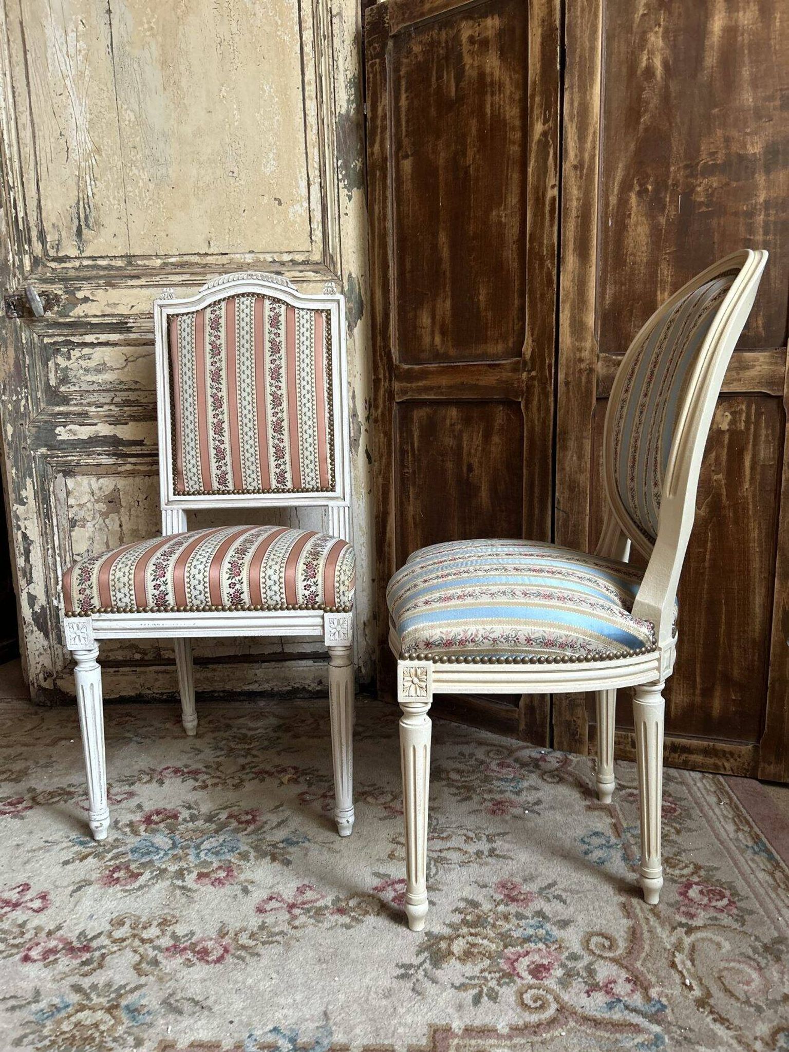 Pair of Louis XVI style chairs in painted wood and satin, classic elegance.