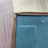 Vintage photo frame in gold and decorated metal