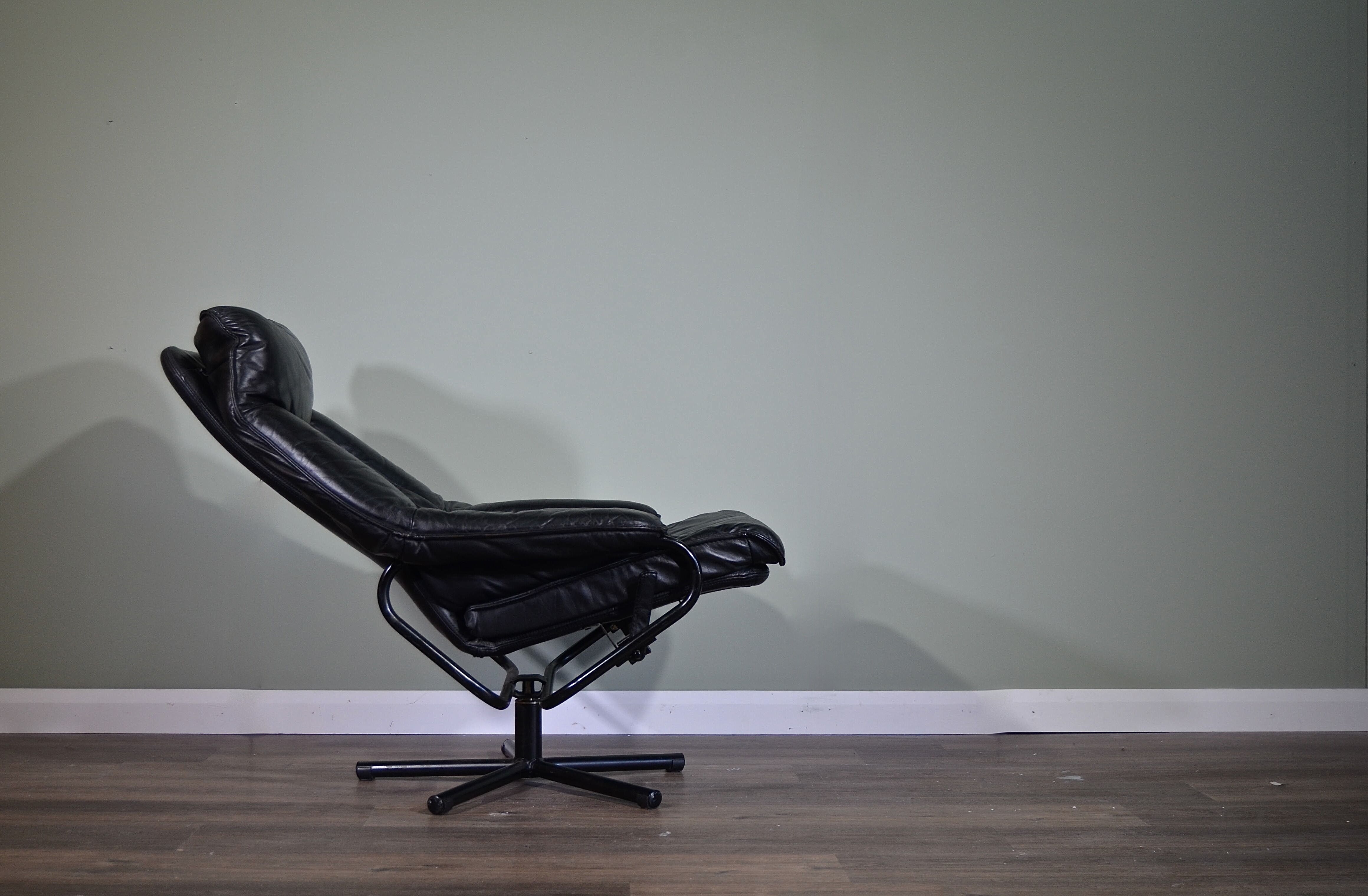 Norwegian Skoghaug industries vintage black leather swivel reclining chair