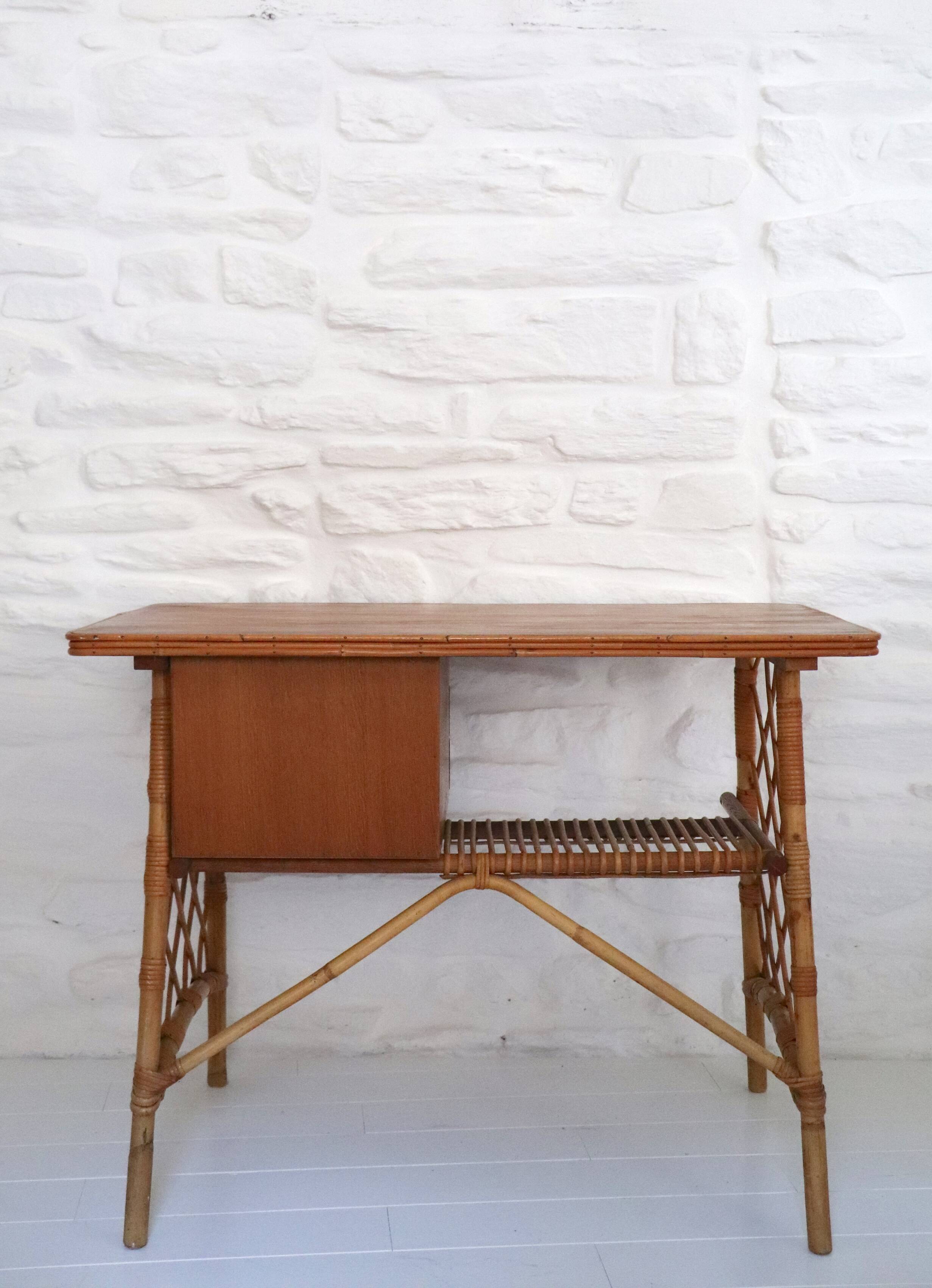Desk and chair in rattan, Louis Sognot, 1950s-1960s.