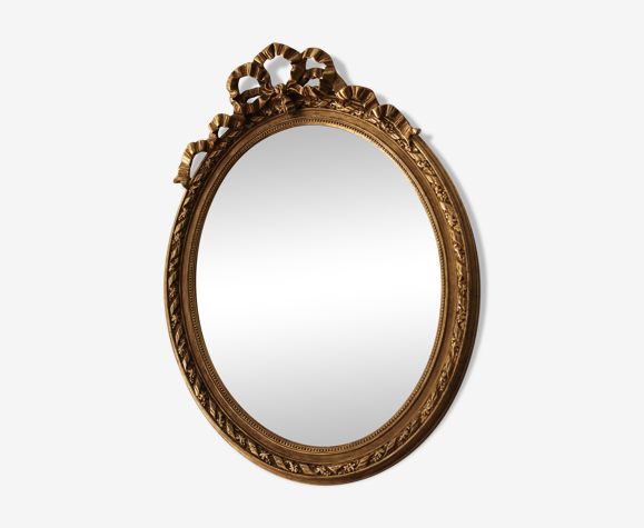 Miroir oval, style Louis XVI doré