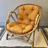 Rattan basket armchair with its cushion
