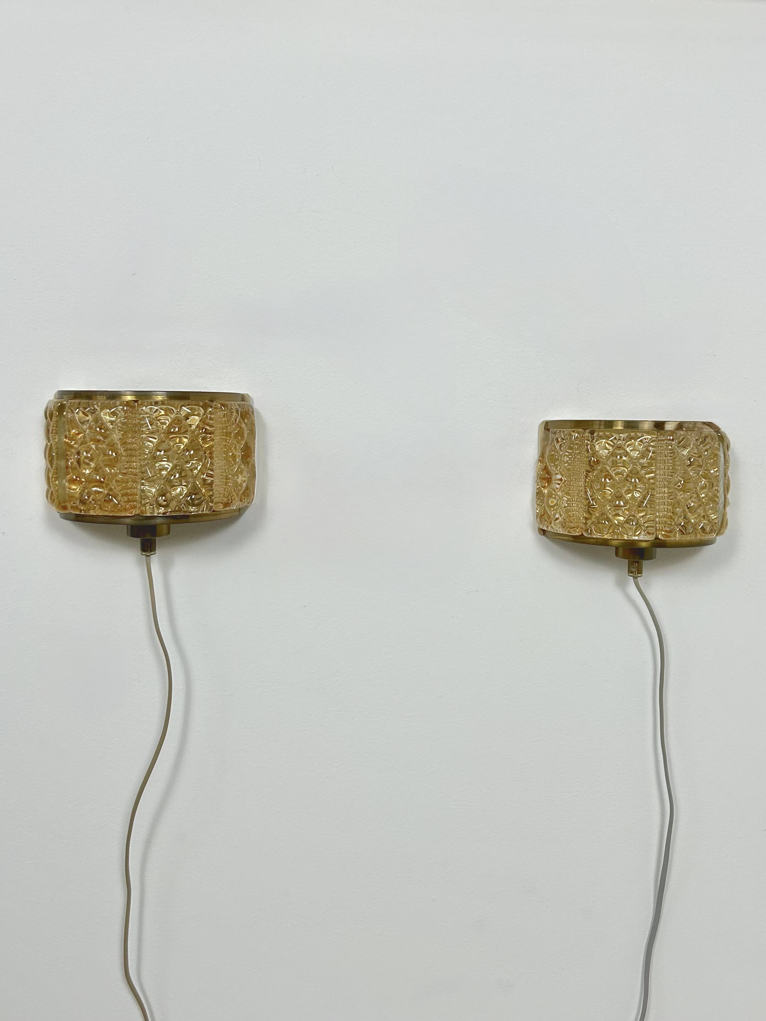 Pair of vintage wall lights, Murano glass and brass, Sweden, 1960.