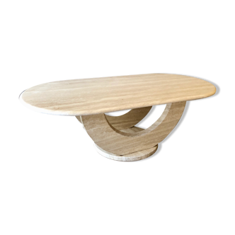 Travertine coffee table with geometric foot
