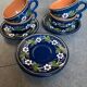 4 teacups and saucers
