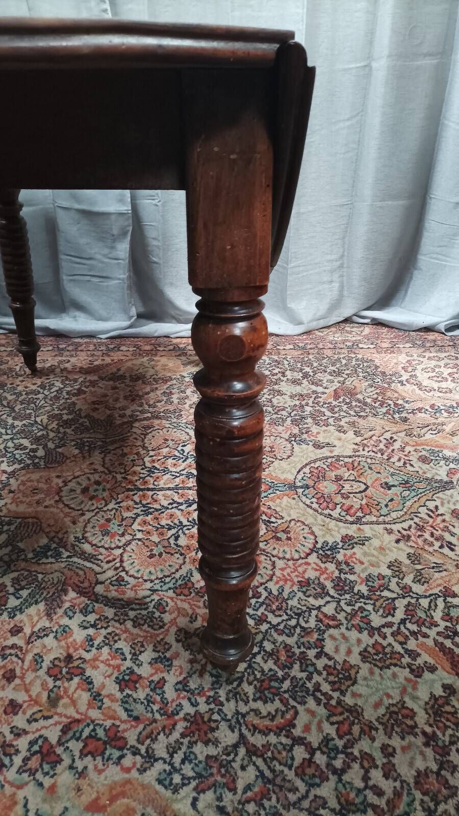 19th-century Louis Philippe walnut drop-leaf table.