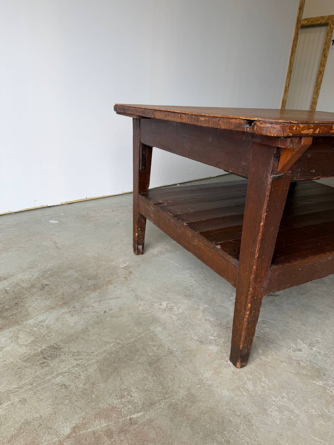 Antique draper's workbench / haberdashery table in solid wood from the early 20th century.