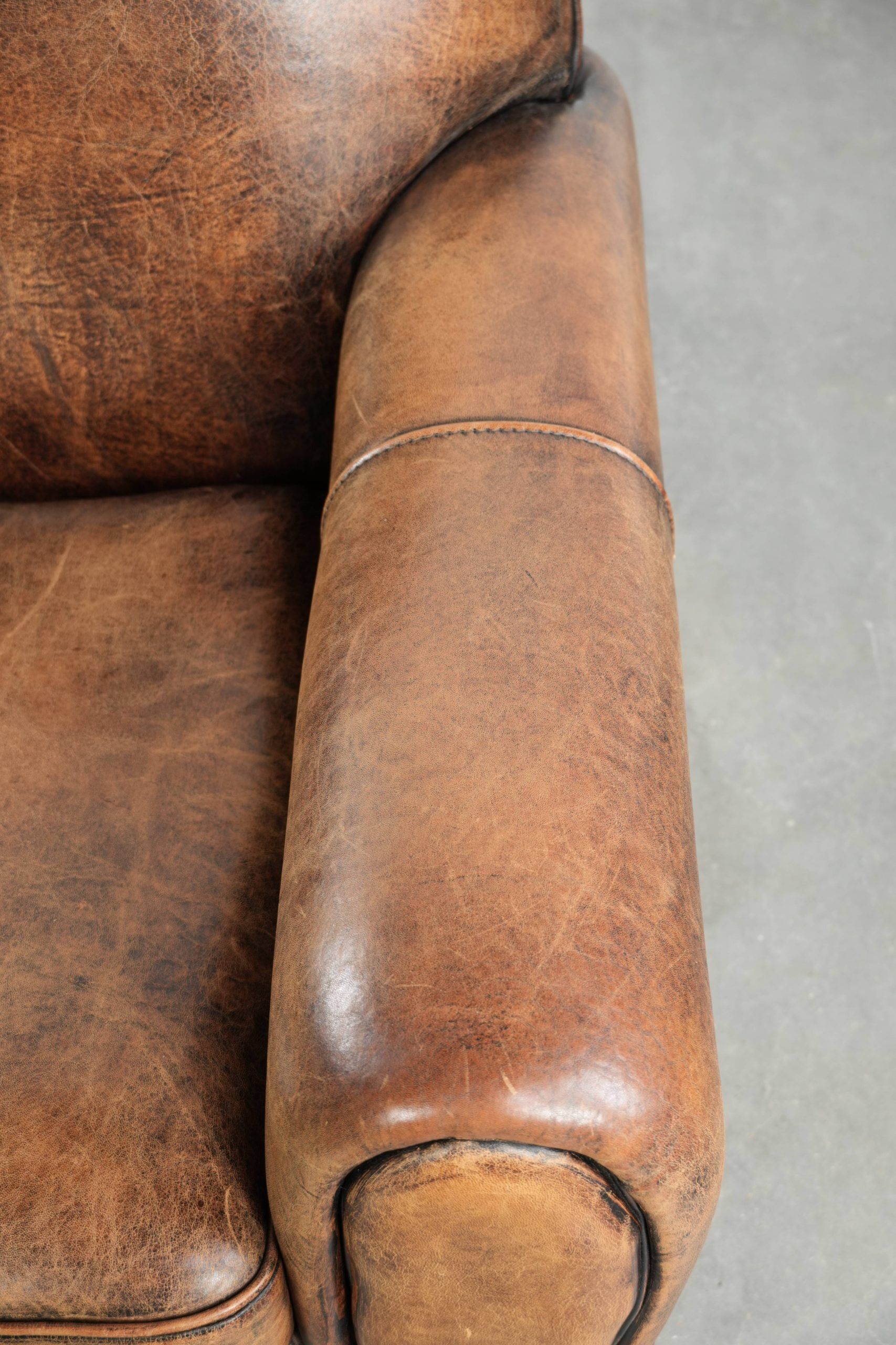 Armchair made of sheepskin leather in Art Deco design with beautiful patina