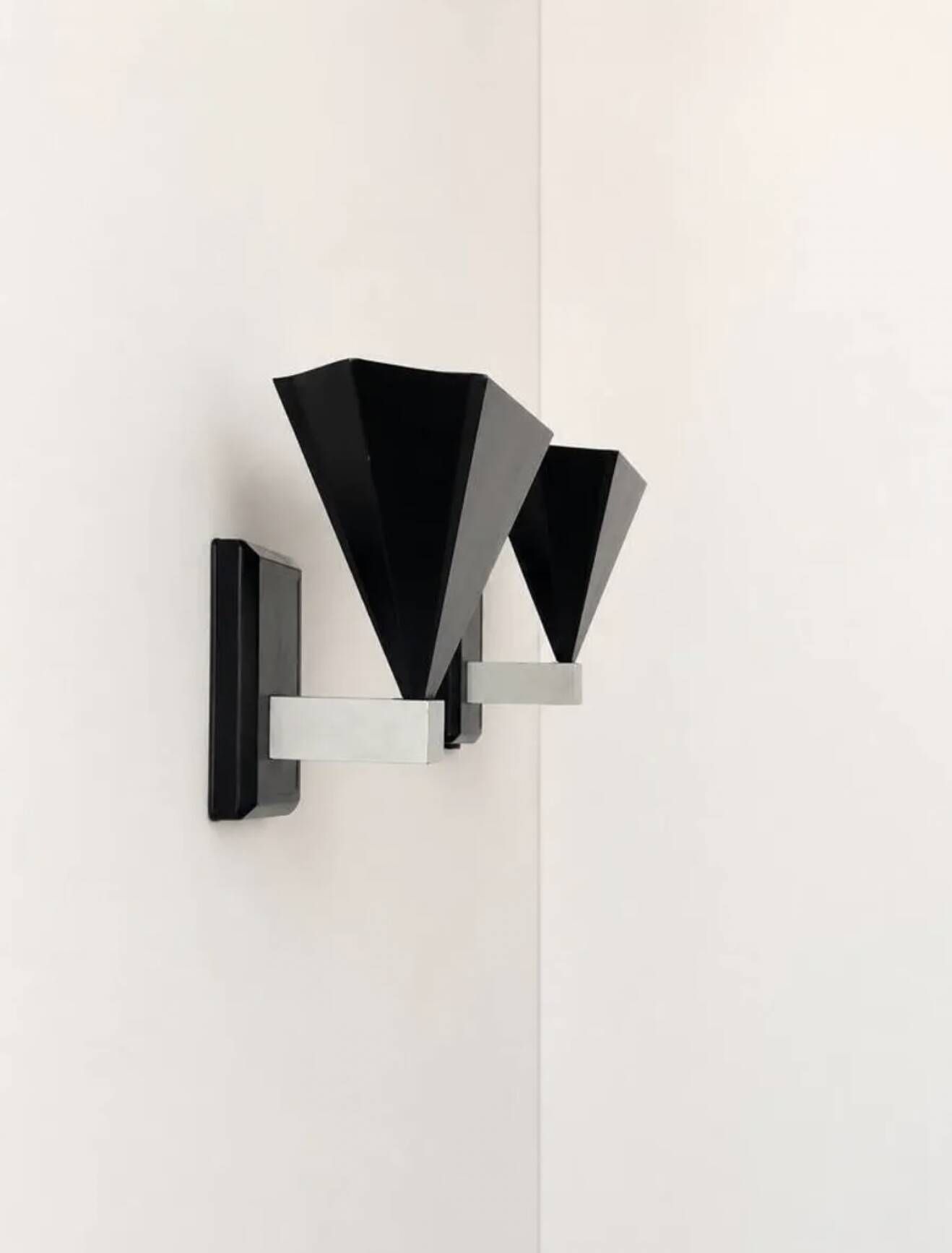Pair of vintage wall sconces, matte black metal, Italy 1980.