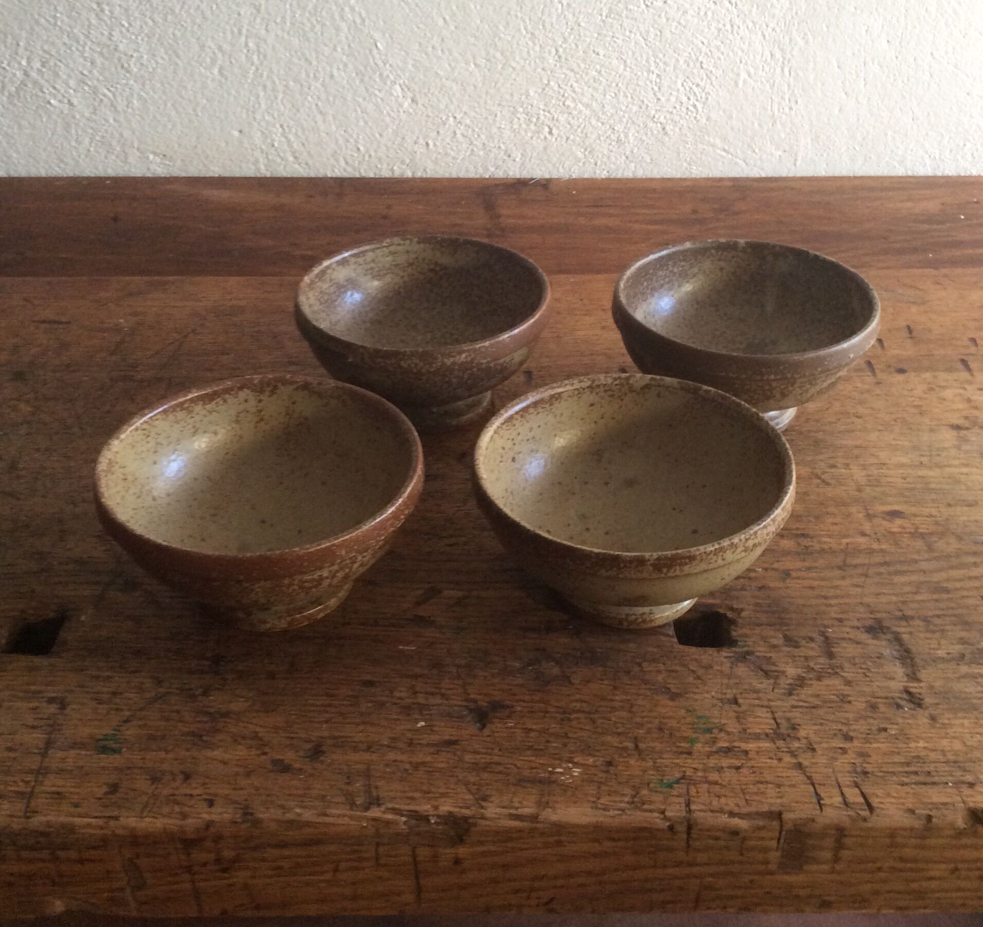 Set of 4 old bowls in stoneware