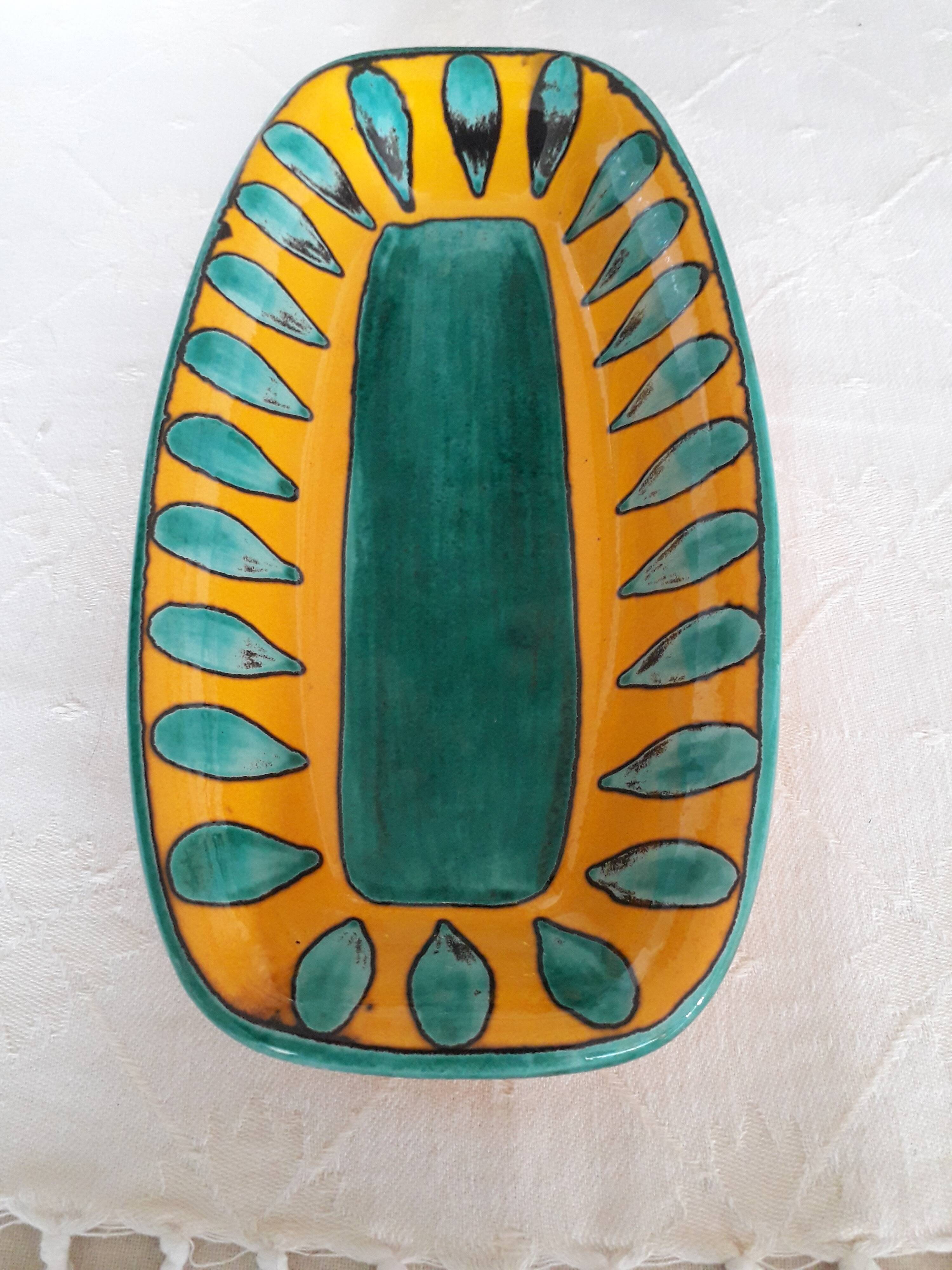 Ceramic pocket emptier from Saint Clément