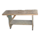 Small brown country bench in solid pine, from the period 1890-1919, rustic style.