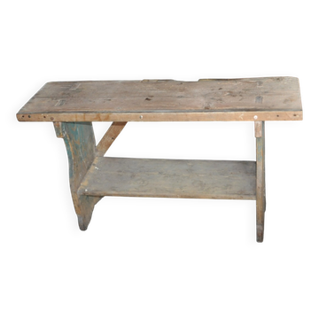 Small brown country bench in solid pine, from the period 1890-1919, rustic style.