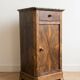Antique bedside table in wood and grey marble, old brown.