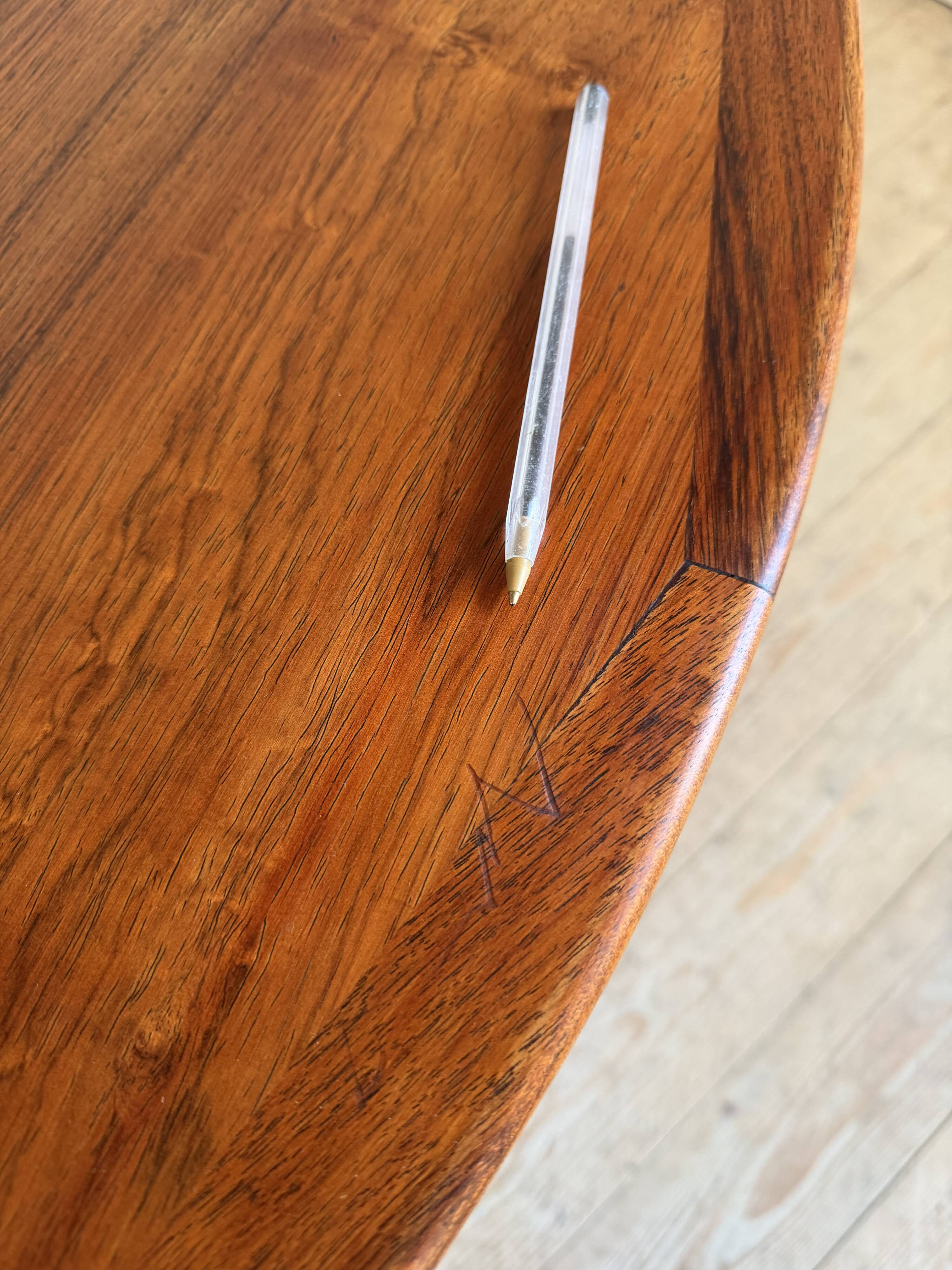 Scandinavian round table in rosewood by Ib Kofod Larsen