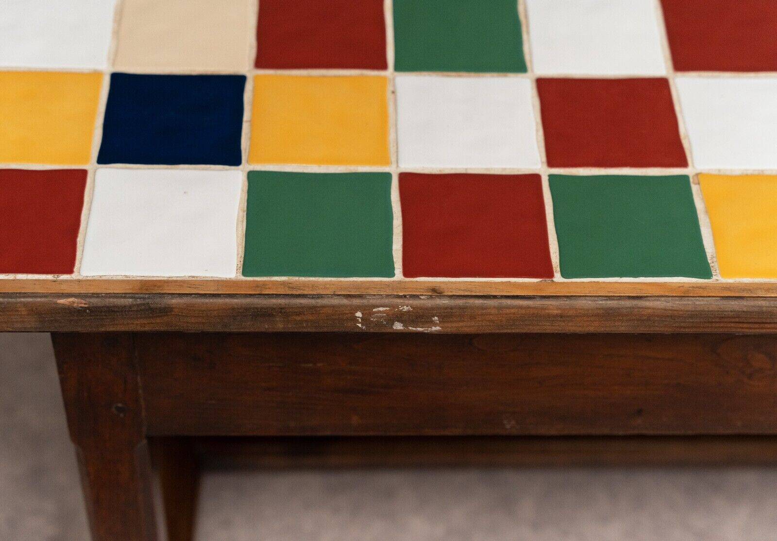 19th century oak farm table with multi-colored ceramic tiles