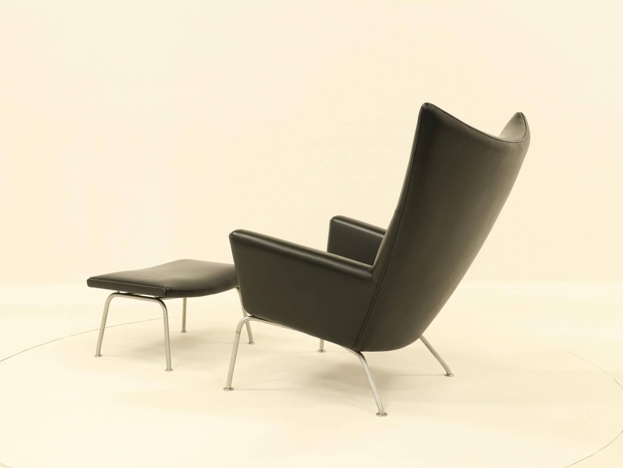 Wing chair & matching ottoman – CH445 & CH446 – by Hans Wegner