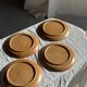 Set of 4 flat dinner plates in stoneware, no brand underneath.