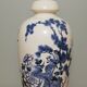Ceramic lamp with Asian decoration with matching lampshade.