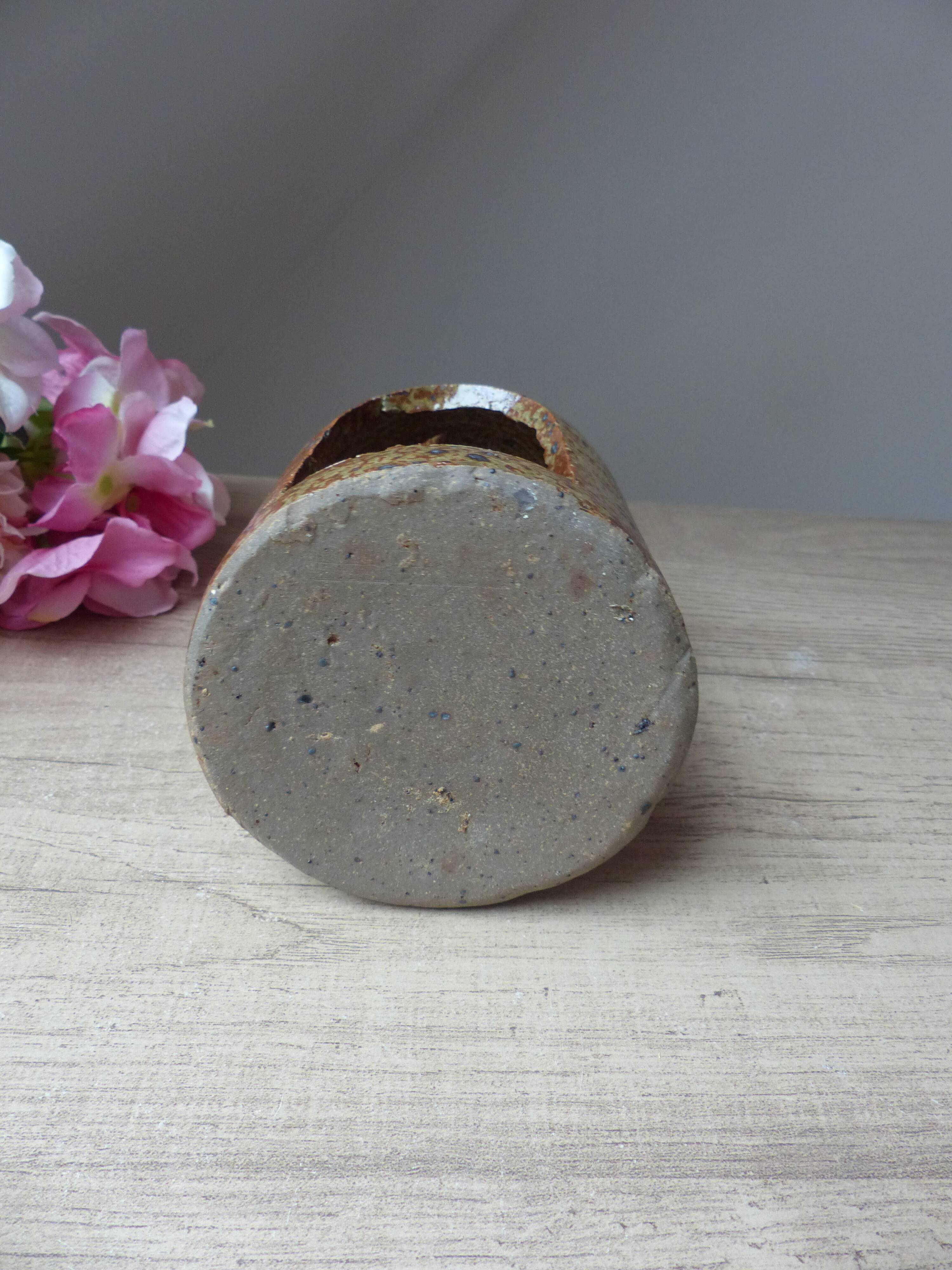 Old candle holder lantern in pyrite sandstone, decorative lantern