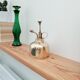 Vintage vaporizer in golden brass 70s