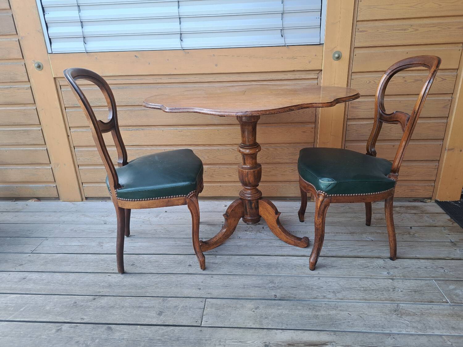 Pair of antique scroll chairs