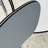 Set of two vintage grey Formica and chrome chairs.