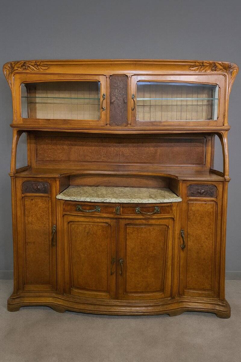 According to Gauthier-Poinsignon: large two-body buffet from the Art Nouveau period in walnut and burl.