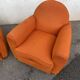 Pair of vintage orange club chairs