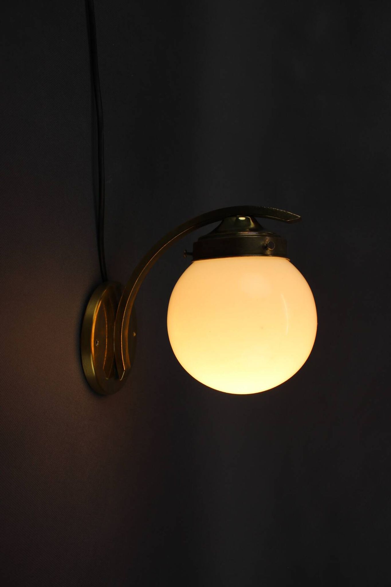 Pair of Art Deco wall sconces in brass and opaline glass, Europe, 1930s