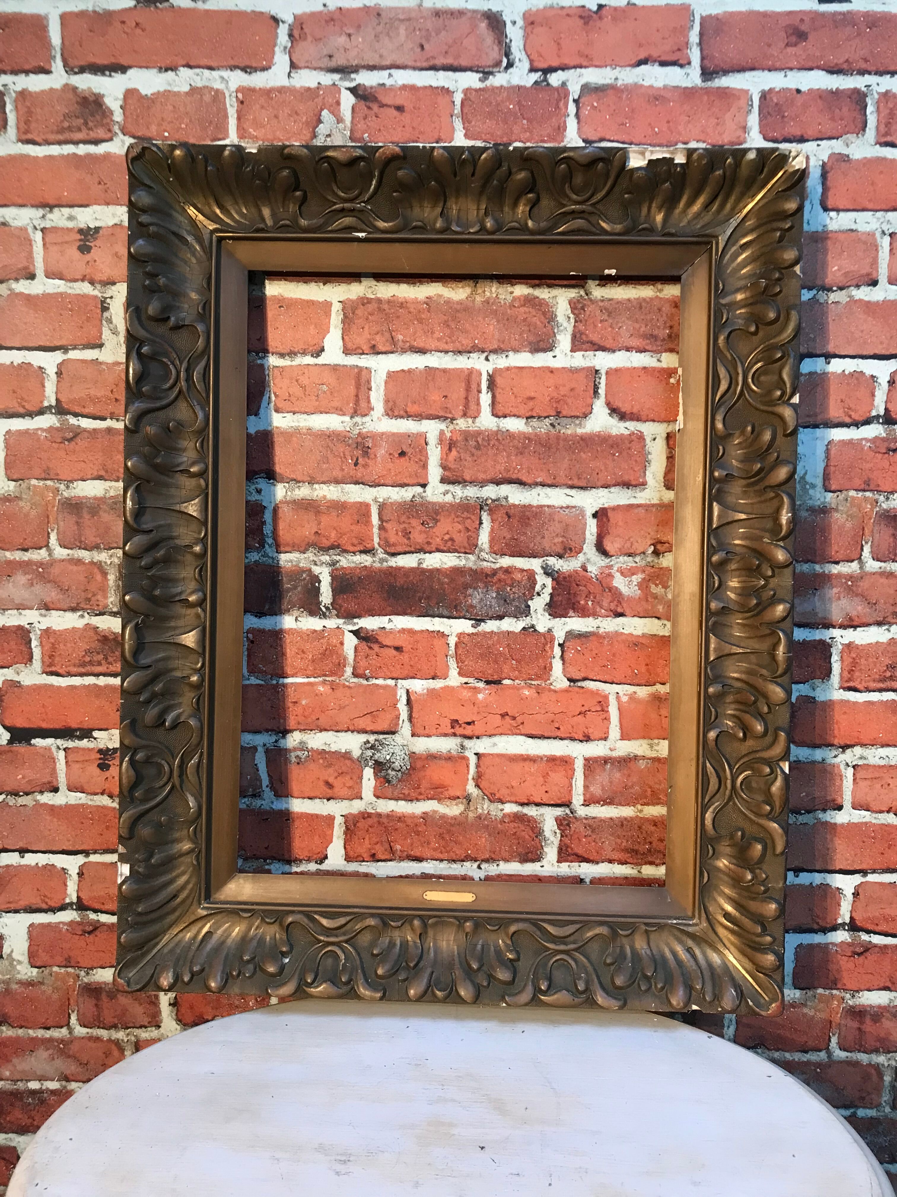 Wooden frame and stucco moldings