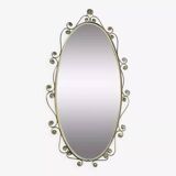 Oval brass mirror