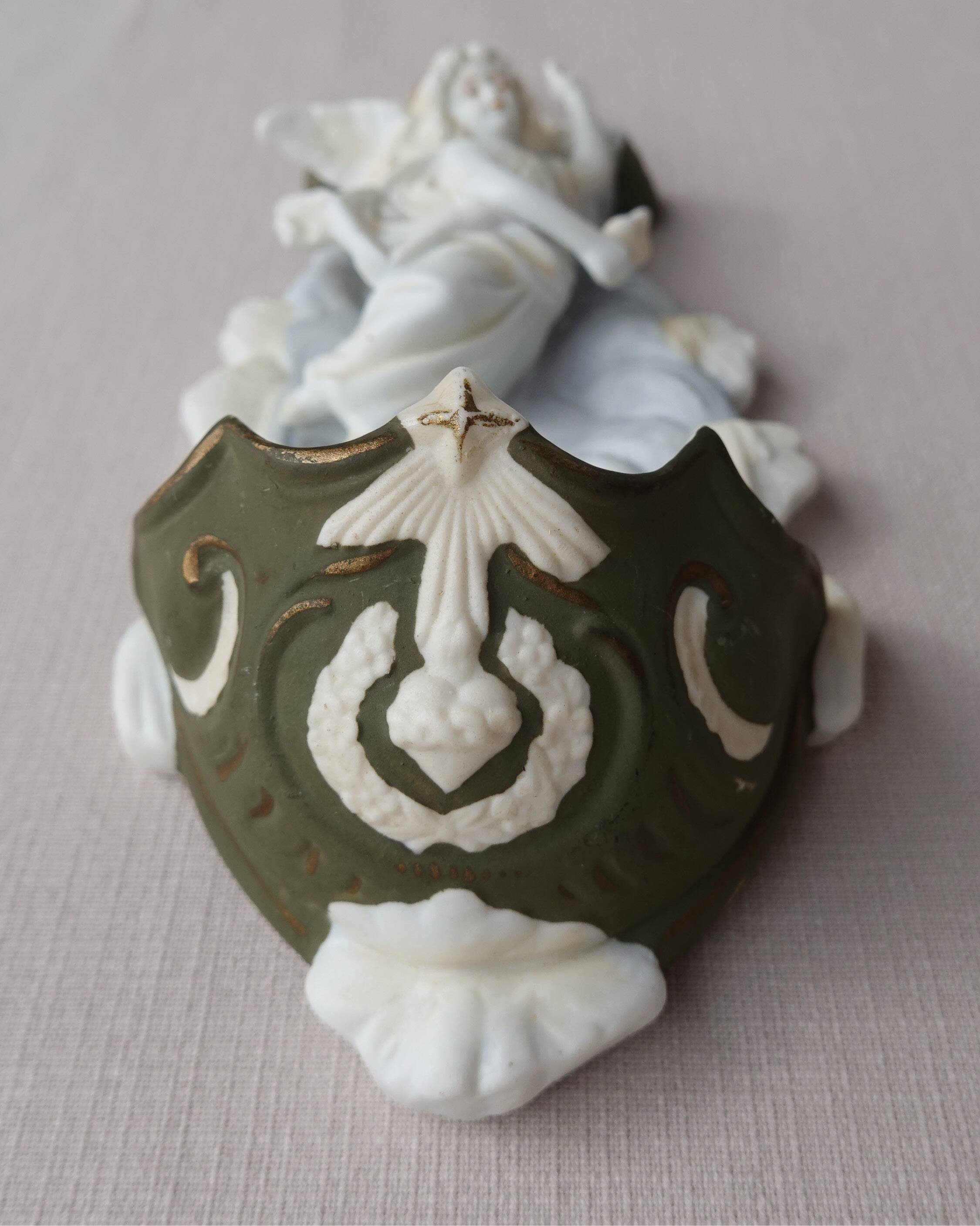 Wall angel holy water font