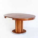 Table à manger avec une rallonge centrale. Vintage. Style Art Déco. Bois vernis. France, années 60.
