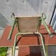 Former green metal child chair