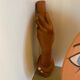 Pair of Jean Marais ceramic wall lamps