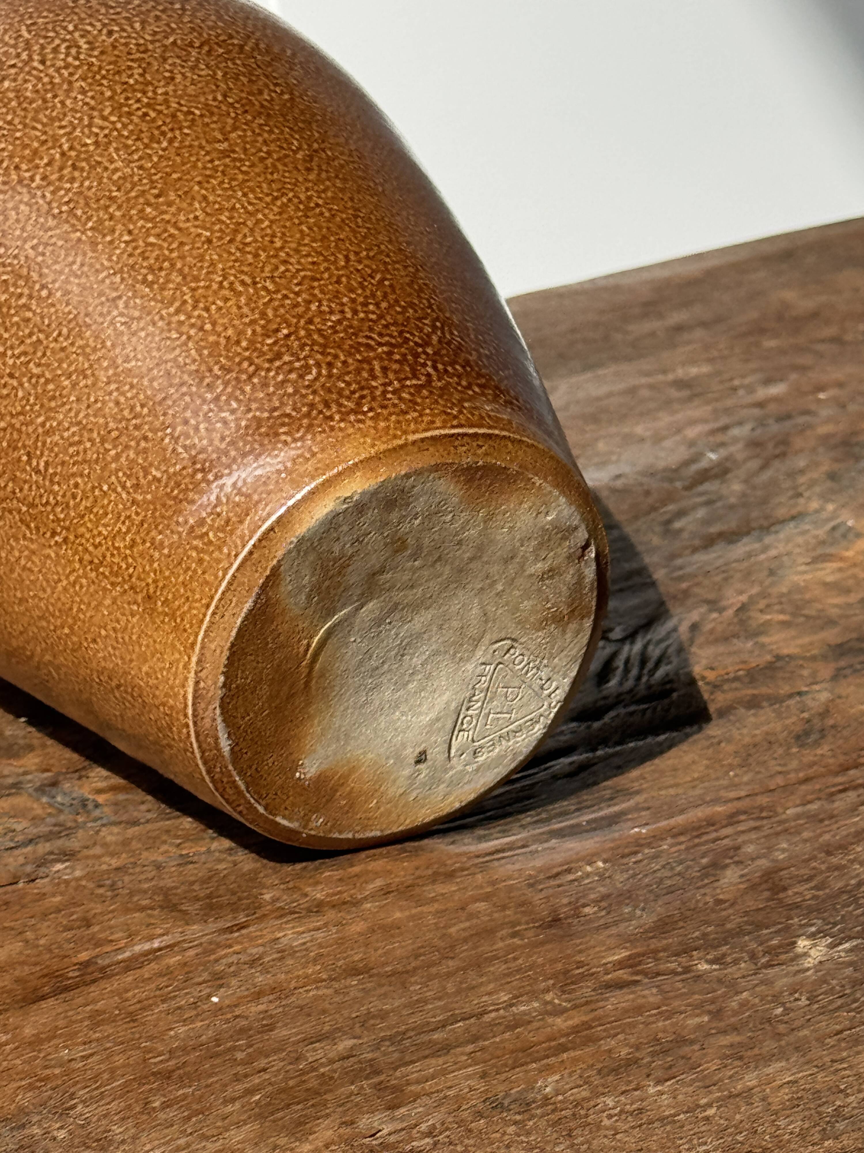 Sandstone demijohn in Pont des Vernes, France
