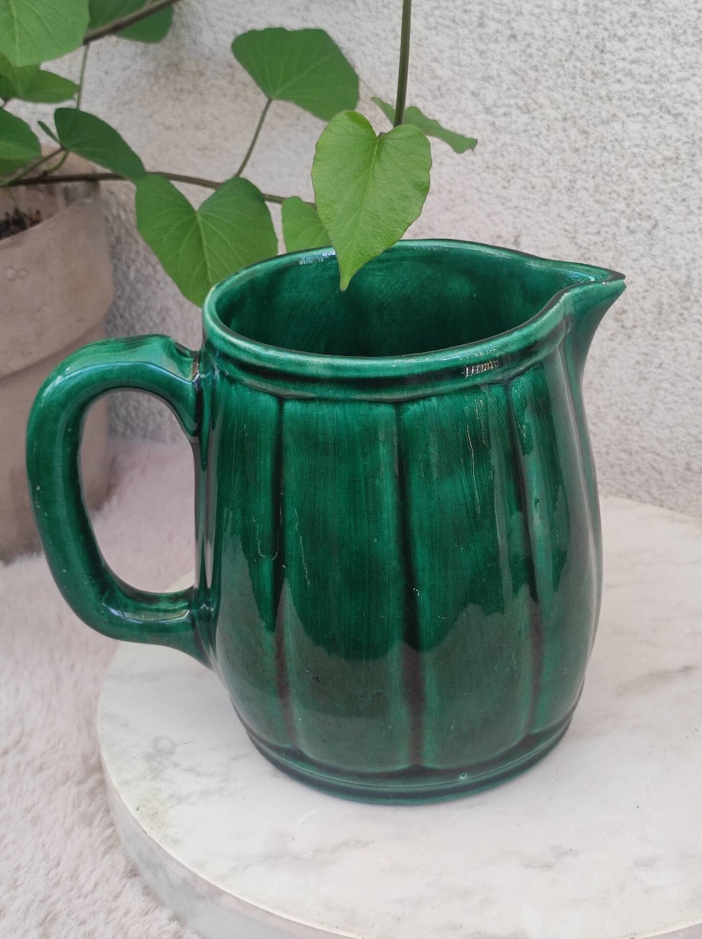 Old green jug