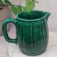Old green jug