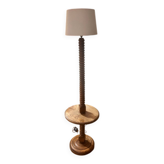Oak floor lamp made of turned wood.