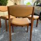 4 Scandinavian chairs in Baumann style made of solid wood and beige leather, 1960.