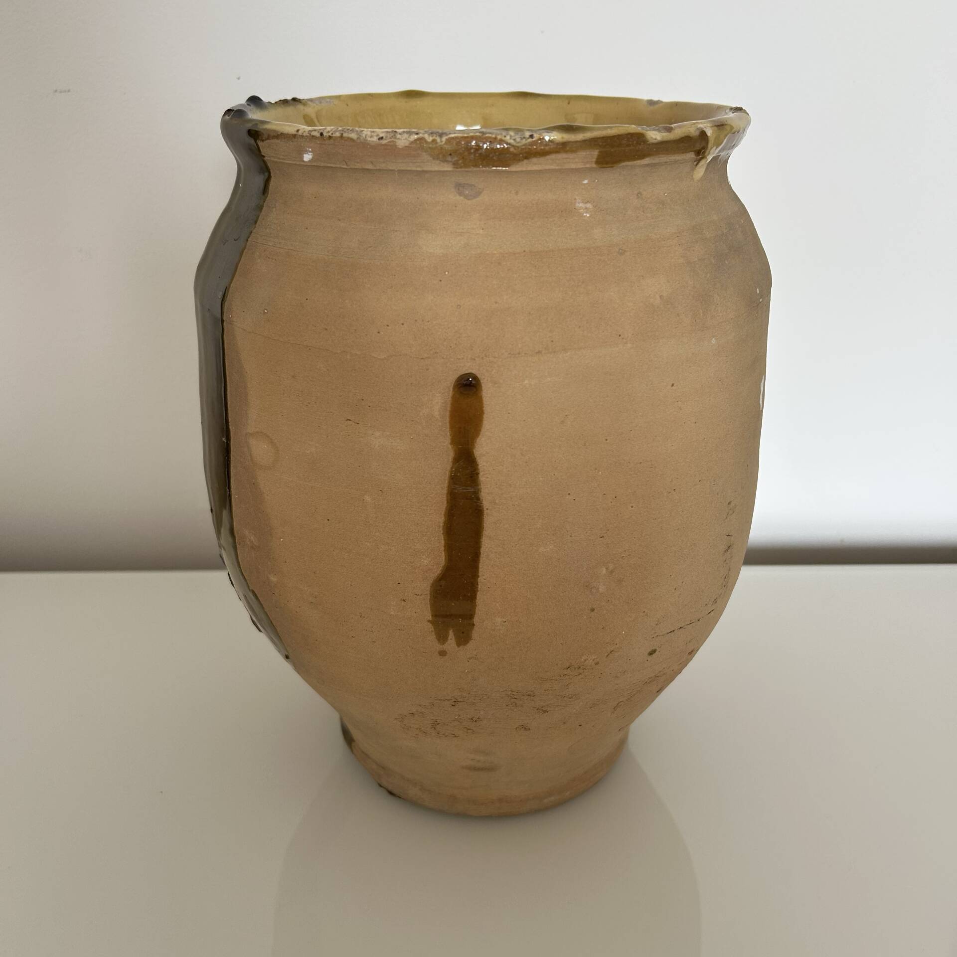 Old jar with brushstroke decoration