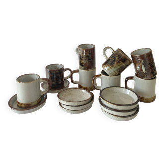 8 ceramic cups and saucers