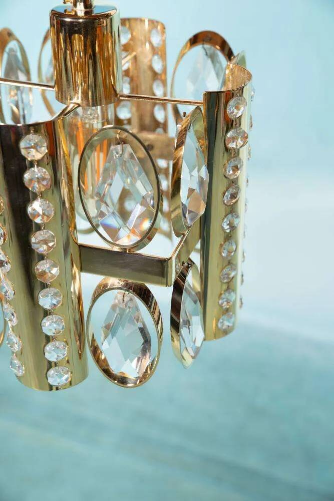 Palwa mid-century suspended chandelier in crystal, glass and brass.