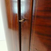 Edwardian mahogany bow-fronted wardrobe by Maple & Co