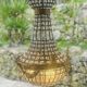 Large Montgolfiere chandelier in gilded bronze and faceted glass pendants