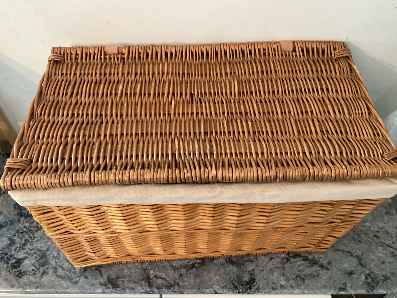 Woven wicker vintage suitcase